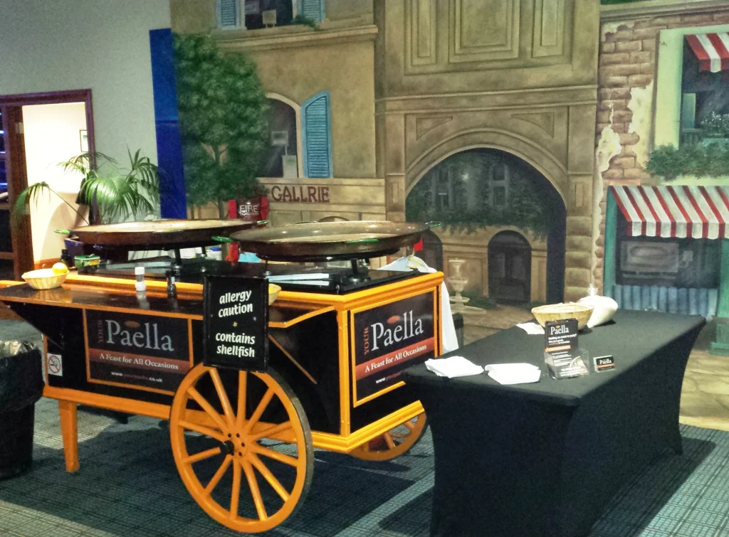Professional paella catering setup for a corporate event using the Your Paella Cart