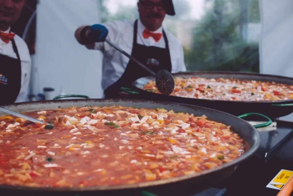 Two large Paella pans at private party catering